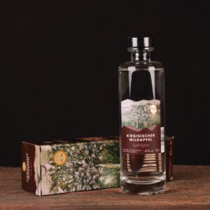 Flasche Kirgisischer Wildapfel-Gin mit Tian-Shan-Äpfeln und Botanicals; klare Spirituose mit frisch-zitrischer Wildapfel-Wacholdernote.